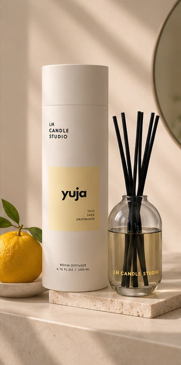 Yuja reed diffuser by LH Candle Studio in a sunlit lifestyle setting