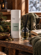 Namu reed diffuser by LH Candle Studio in a cozy wooden reading nook
