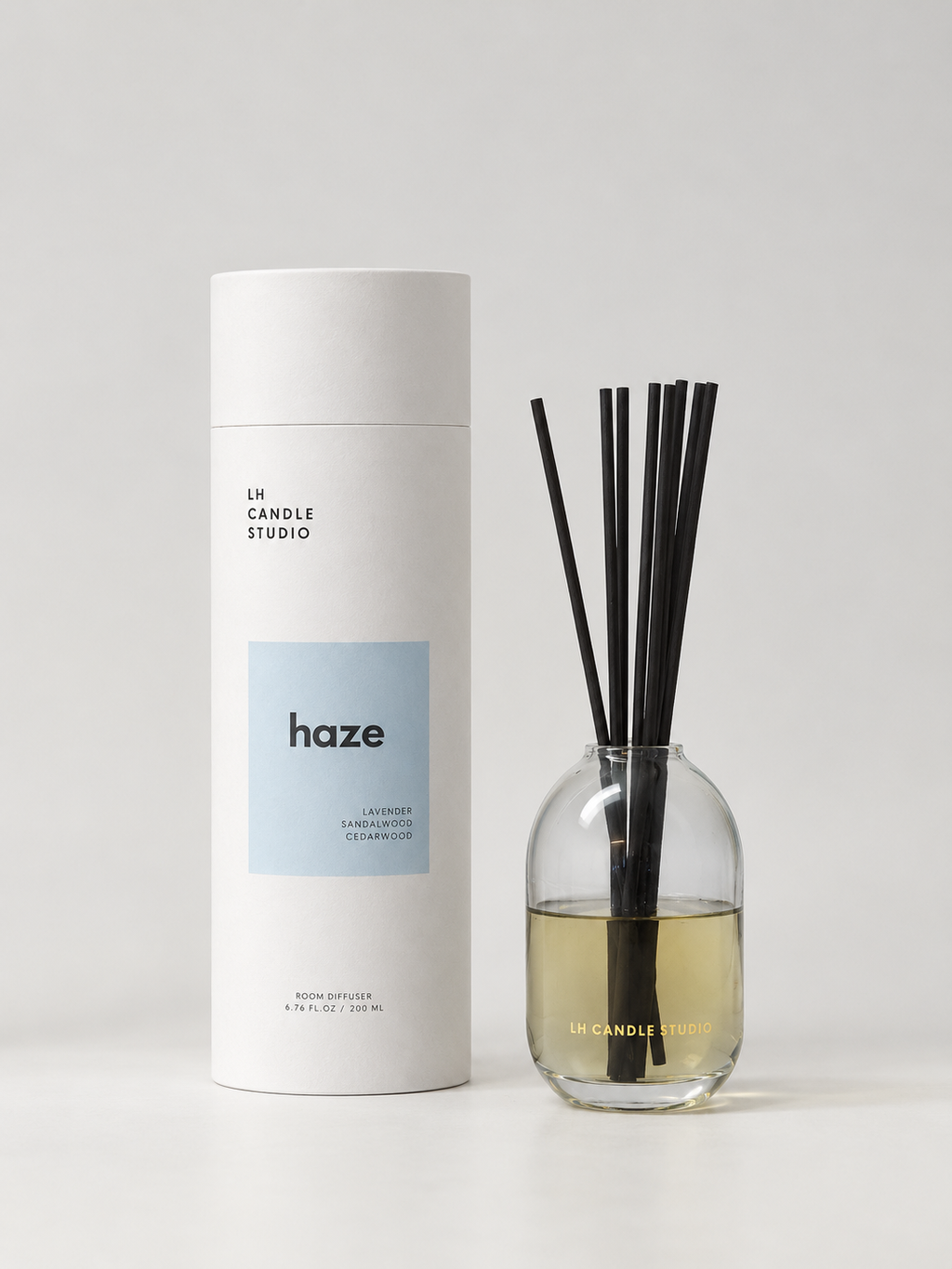 Haze reed diffuser by LH Candle Studio in a bright, minimal still life