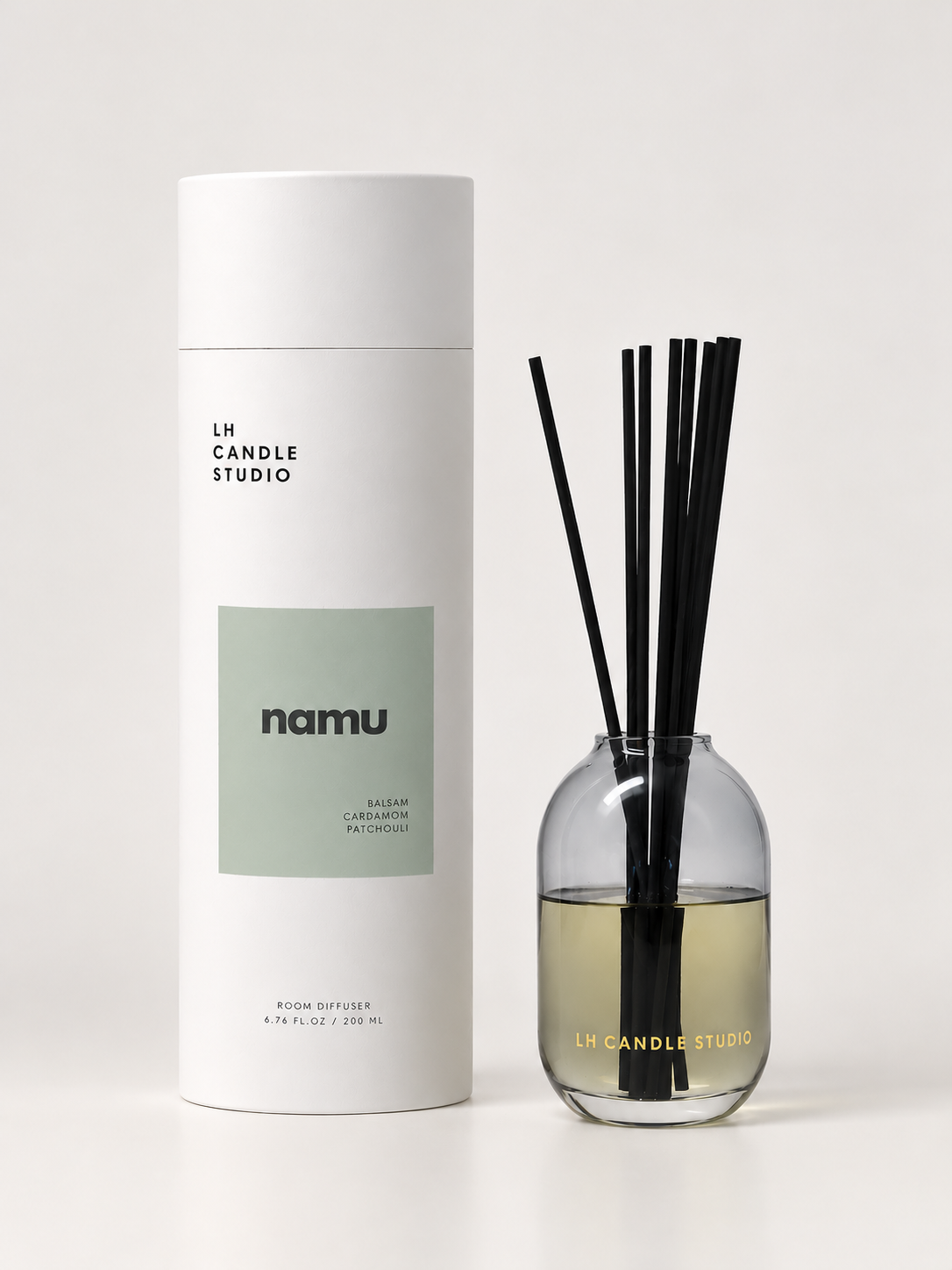 Namu reed diffuser by LH Candle Studio in a clean, minimalist studio setting
