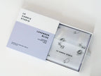 Lavender Bliss wax tablet box opened, wrapped in LH Candle Studio tissue paper